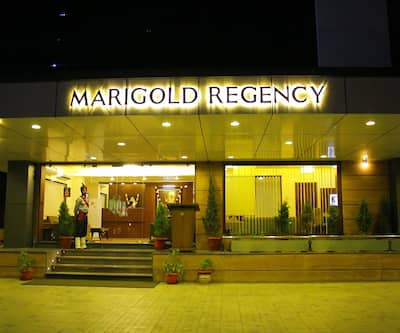 https://imgcld.yatra.com/ytimages/image/upload/t_hotel_yatra_city_desktop/v1410847761/Domestic Hotels/Hotels_Shirdi/Marigold Regency/Overview.jpg